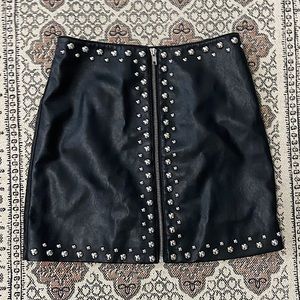 Leather mini skirt with silver stud detail